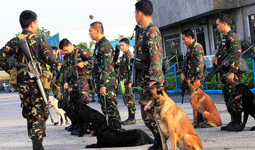 Bomb-sniffing dog saves handler in Philippines