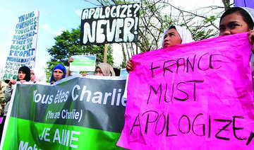 Respect religions, marchers in Philippines tell Charlie Hebdo