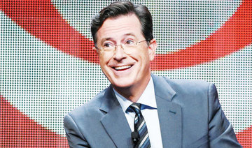 Comic Colbert steps into TV legend Letterman’s shoes