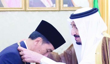 King Salman honors Widodo