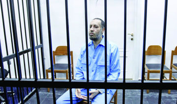Qaddafi’s son in court over murder, repression