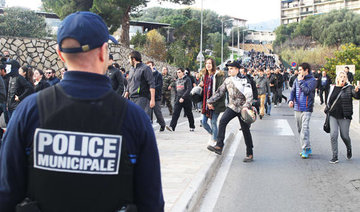Hundreds march in Corsica after anti-Arab protests
