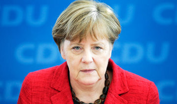 Merkel sticks to migrant course after German polls