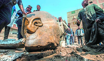 Pharaoh statues found in muddy pit by Egyptian-German team