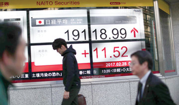 Asian markets boosted by Fed but dollar sinks