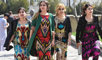 Tajikistan steps up use of traditional over Islamic clothing