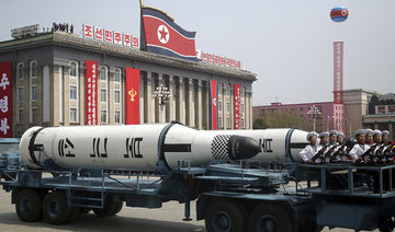 North Korea flaunts long-range missiles in massive parade