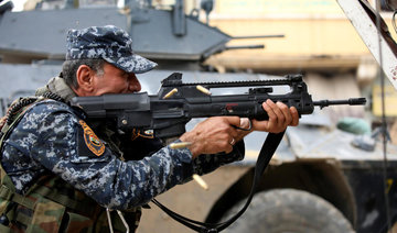 Iraqi troops capture largest neighborhood in western Mosul