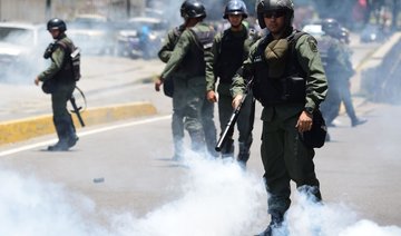 Venezuela death toll hits 29, protesters battle security forces