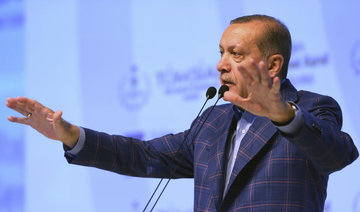 Turkey’s Erdogan to rejoin ruling party after referendum win
