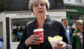 British PM scorned for ‘awkward’ chip eating photos