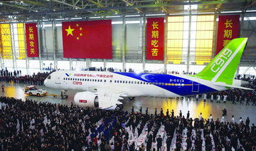 China’s homemade passenger jet aces first flight
