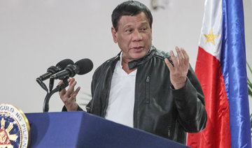 Philippine president imposes public smoking ban