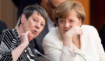 Merkel vows to convince climate change ‘doubters’