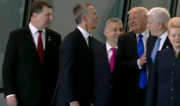 Watch: Trump appears to push aside a PM during NATO summit