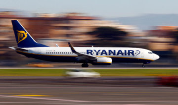 Ryanair posts record annual profit, vows to continue fare cuts
