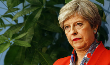 British PM loses majority, faces pressure to resign