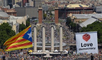 Catalans woo immigrants in quest to split from Spain