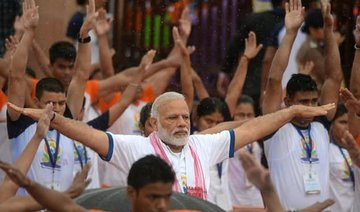Yoga connecting world, says Modi as millions stretch and bend