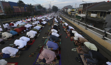 Muslims in Asia pray for peace as Ramadan holy month ends