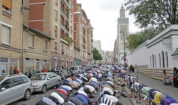 Man tries to drive car into crowd in front of French mosque