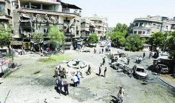 20 killed as three car bombs rock Damascus