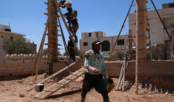 “You destroy, we rebuild“: a builder’s life in war-torn Syria