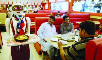 ‘Robot waitress’ draws customers to Pakistani pizza joint