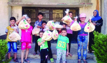 Saudi Arabia distributes bread to 86,000 Syrian families in Lebanon, Syria