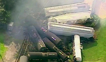 Town evacuated after freight train derails, catches fire