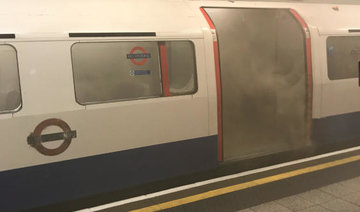 Firefighters extinguish small fire on London Underground train