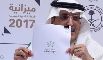 Saudi budget deficit halves as financial reforms kick in