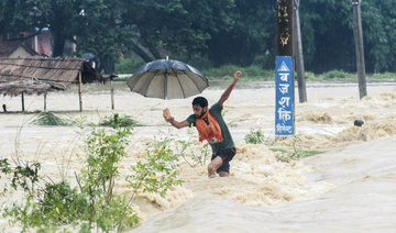 Thousands uprooted as floods kill 143 in India, Nepal