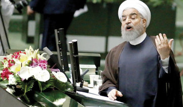 Iranian president threatens to restart nuclear program