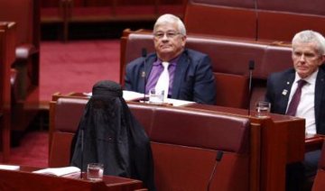 Far-right Australian politician wears burqa in Parliament in protest to get them banned