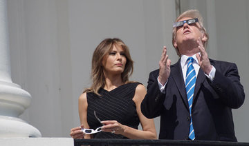 Trump watches eclipse from White House