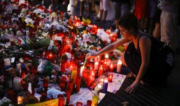 ’Not afraid’: defiant Barcelona to march against terror
