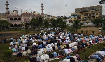 With prayer, sacrifices, Pakistani Muslims celebrate Eid Al-Adha