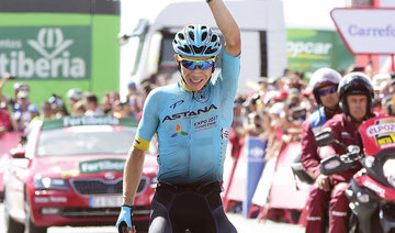Froome extends Vuelta lead, Lopez in second stage victory