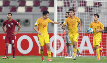 China out of World Cup despite victory over Qatar