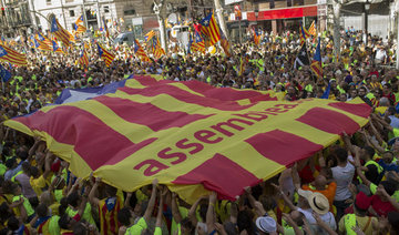 Spain threatens to arrest over 700 Catalan pro-referendum mayors