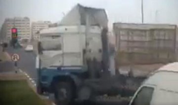 VIDEO: Articulated truck in UAE near miss at red light