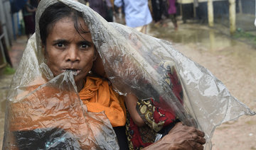 Under fire over Rohingya, Suu Kyi defends Myanmar actions