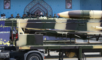 Defiant Iran unveils latest missile