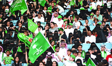 Women allowed into stadium as Saudi Arabia promotes national pride — part of reform push