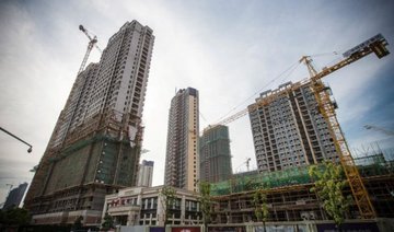 Chinese cities impose new property controls to curb speculation