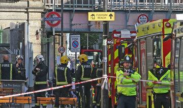 British police arrest seventh man over bomb attack on London train