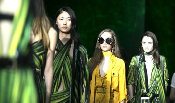 Amazonian color, dramatic silhouettes hit the Paris runways