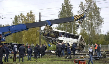 At least 16 killed as train hits bus in Russia