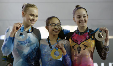 Gymnastics: Hurd captures surprise all-around World gold